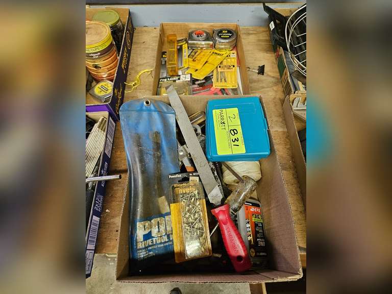 Box of jigsaw blades, drill bits, another box of hand tools, and pop