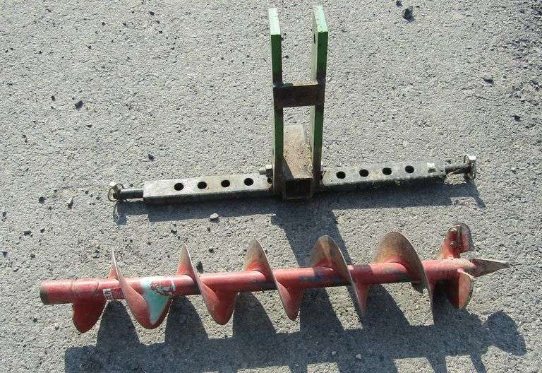 E142 3 Point Hitch + Auger Pickett Auction Service