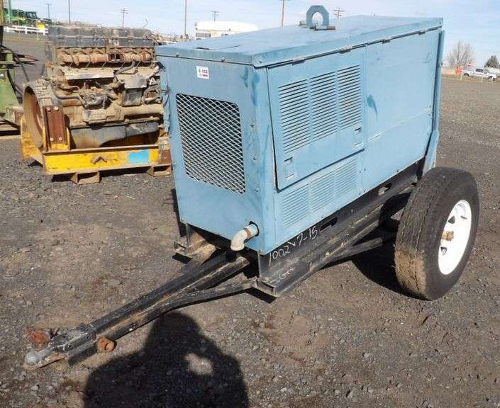 C-152 Miller Welder Trailer - Pickett Auction Service
