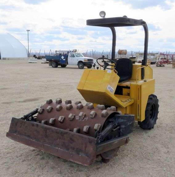 D-915 1999 John Deere Stone PDB54 Compactor - Pickett Auction Service
