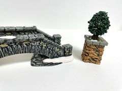“Limestone Footbridge” & “Stone Corner Posts with Holly Tree” by Department 56