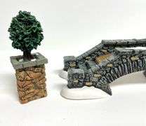 “Limestone Footbridge” & “Stone Corner Posts with Holly Tree” by Department 56