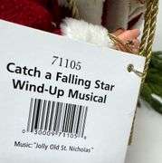Clothtique “Catch A Falling Star” Musical Santa