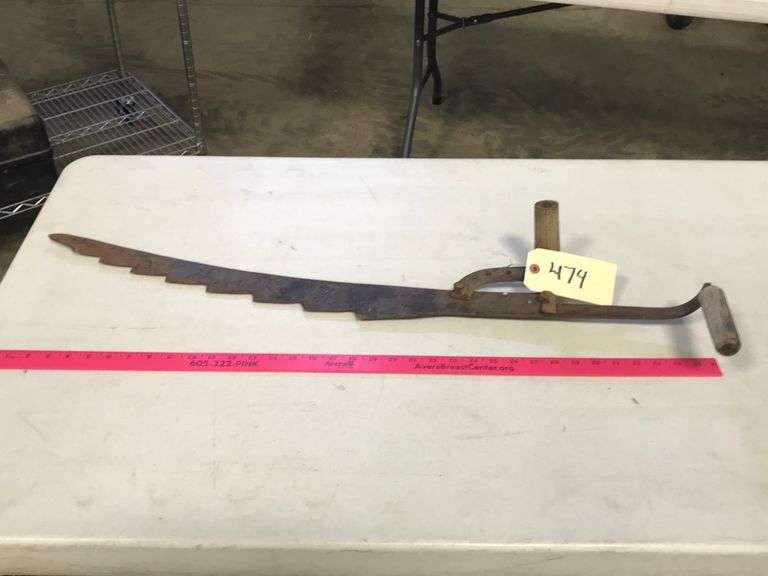 Hay knife Peterson Land & Auction LLC