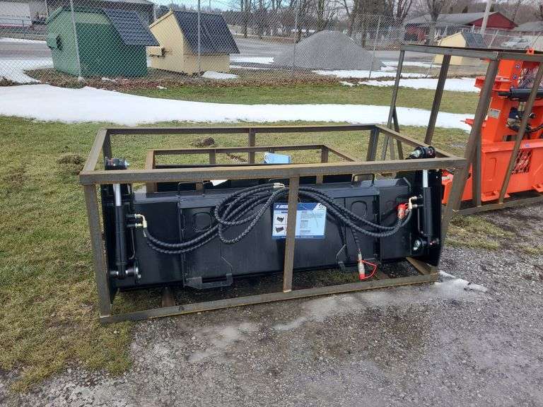 Topcat 4 in 1 Bucket Rogers Community Auction Inc.