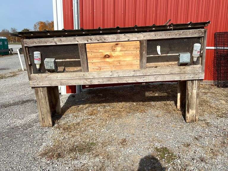 Double Rabbit Hutch w/ Feeders & Waterers Rogers Community Auction Inc.