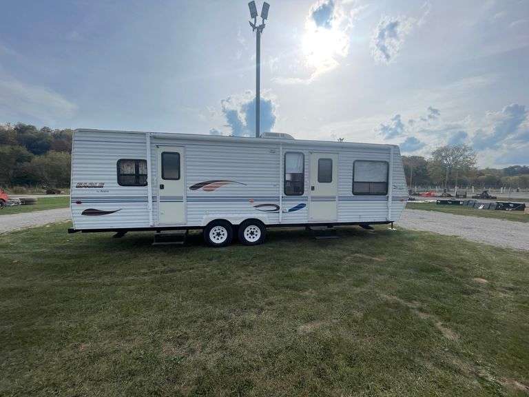 26' Jayco Bumper Pull Camper Rogers Community Auction Inc.