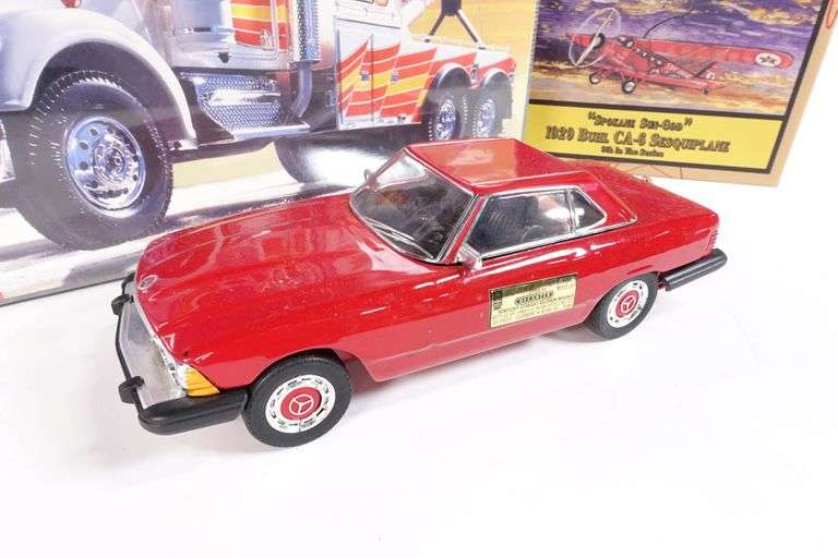 "ABSOLUTE" Lot Consisting of a Revell Kenworth Wrecker, Jim Beam