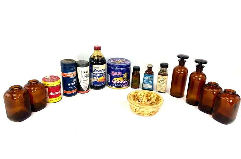 Assorted Amber Glass Bottles RES Auction Services