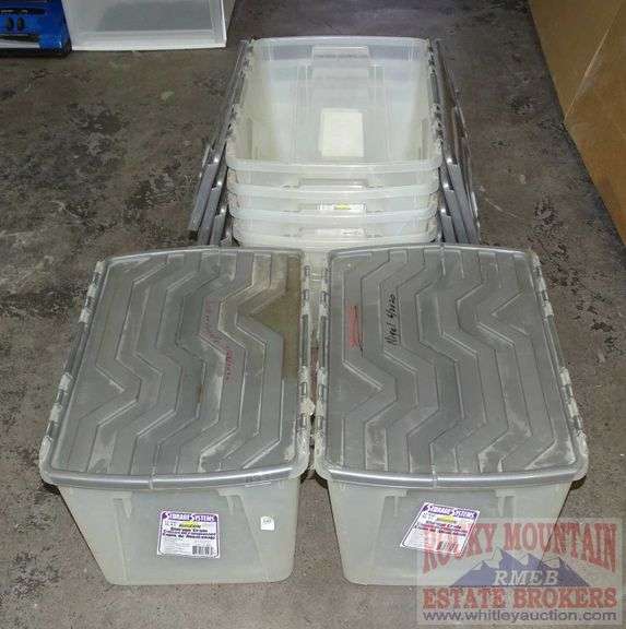 6 12Gallon Plastic Totes with Grey Attached Lids. One or two have some