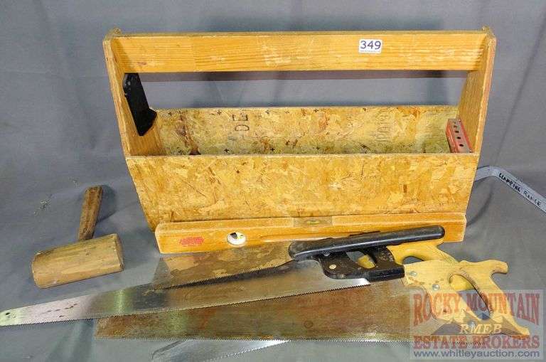 Wooden Tool box with assorted hand saws, wooden mallet, 2' wooden level