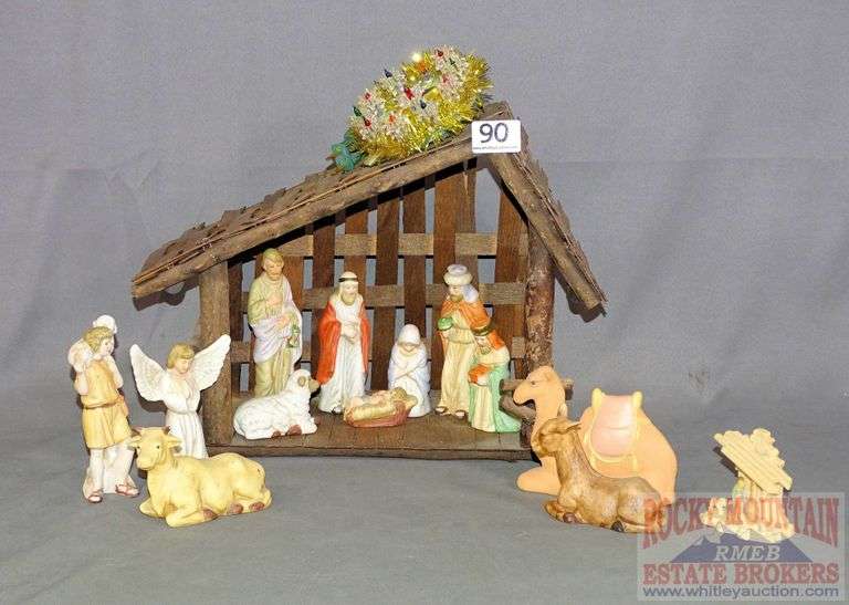 14 piece porcelain Nativity Set with manger. Rocky Mountain Estate Brokers Inc.