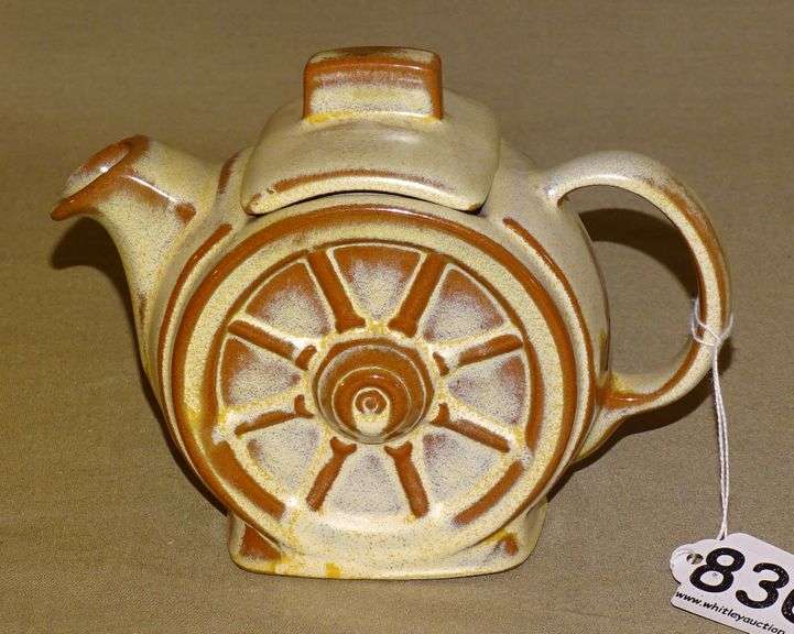 Frankoma Wagon Wheel Teapot. Rocky Mountain Estate Brokers Inc.