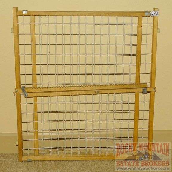 Adjustable Baby Gate. Rocky Mountain Estate Brokers Inc.