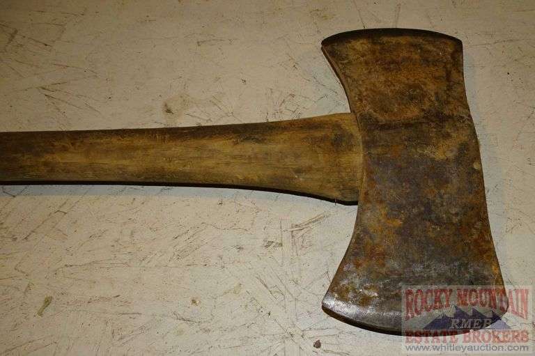 Double Bladed Axe with Wood Handle. Rocky Mountain Estate Brokers Inc.