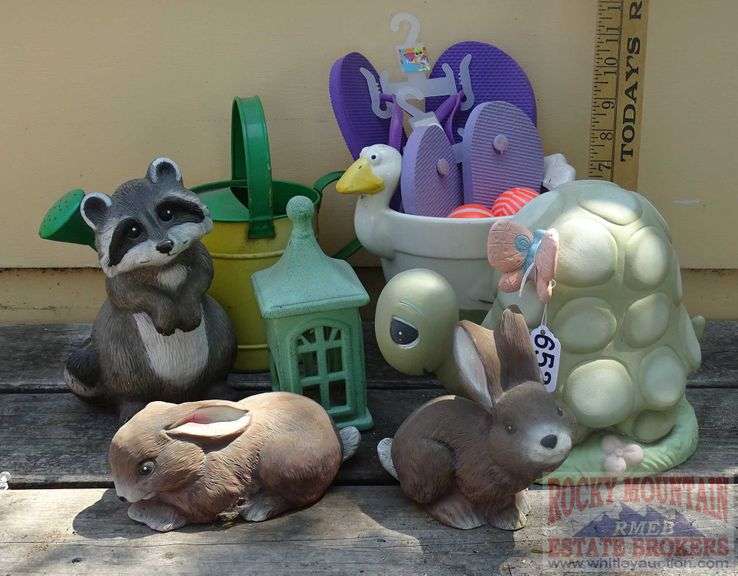 Tin Watering Can, Duck Planter, FlipFlops & Asst. Garden Statues. All