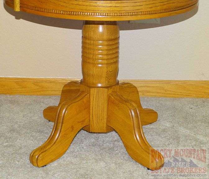 Round Oak single pedestal cocktail table with inlaid top and beaded