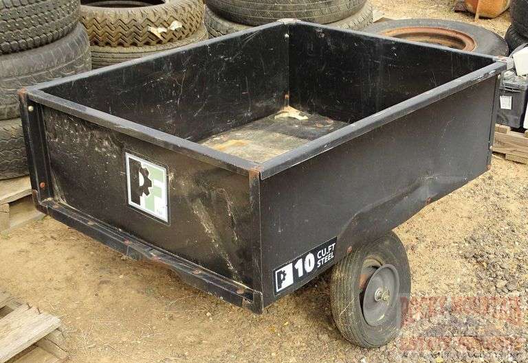 Precise Fit 10 cubic foot lawn tractor dump trailer. May need new tires