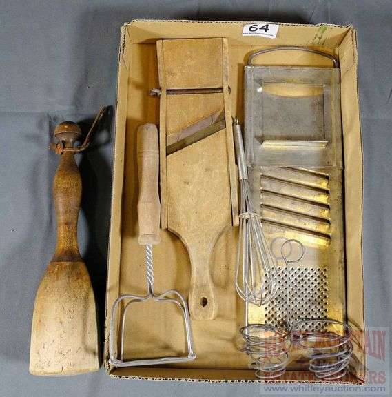 Small kraut cutter, primitive masher & other assorted vintage kitchen utensils. All for one