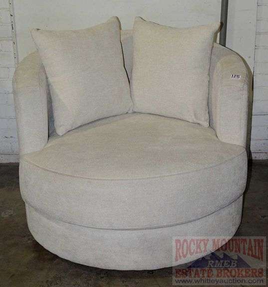 Elliot Oversized "Moon" Swivel Chair. - Rocky Mountain Estate Brokers Inc.