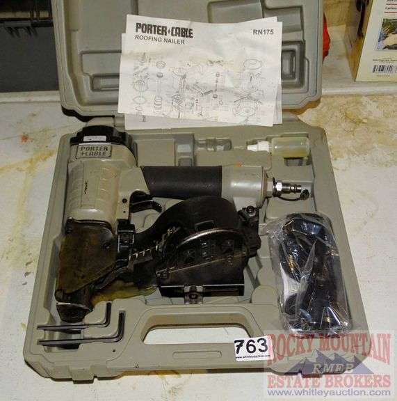 Porter Cable coil roofing nailer in case. Rocky Mountain Estate Brokers Inc.