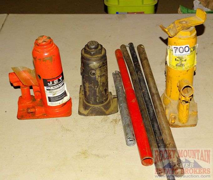 3 assorted hydraulic jacks, handles & more. All for one money. Rocky