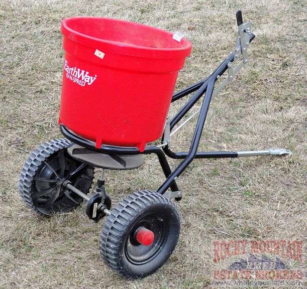 EarthWay EvNSpread towed broadcast spreader. Rocky Mountain Estate