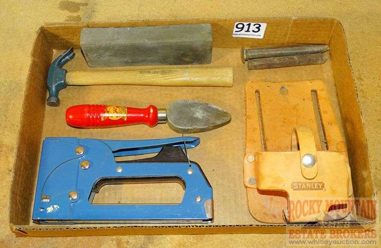 Stanley tape holster, staple gun, small hammer & more. All for one