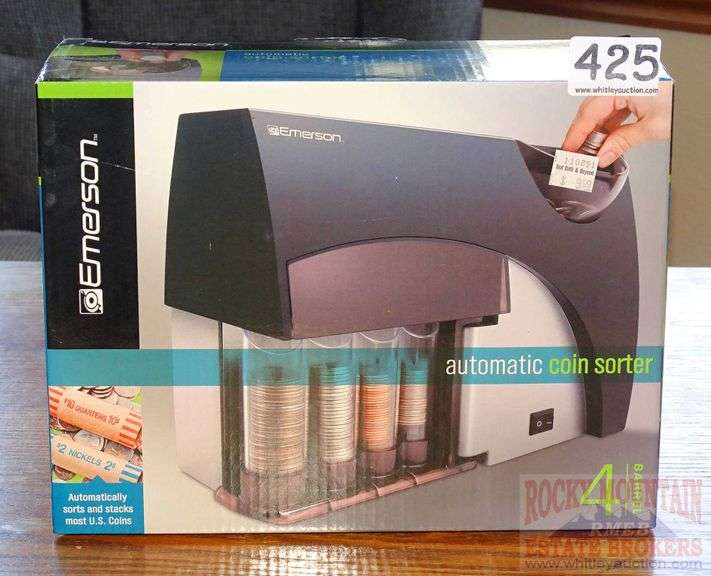 Emerson 4 barrel automatic coin sorter. This appears to be new. Rocky