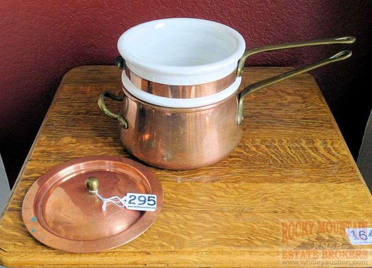 Copper double boiler with white porcelain insert. Pan is 7" diameter