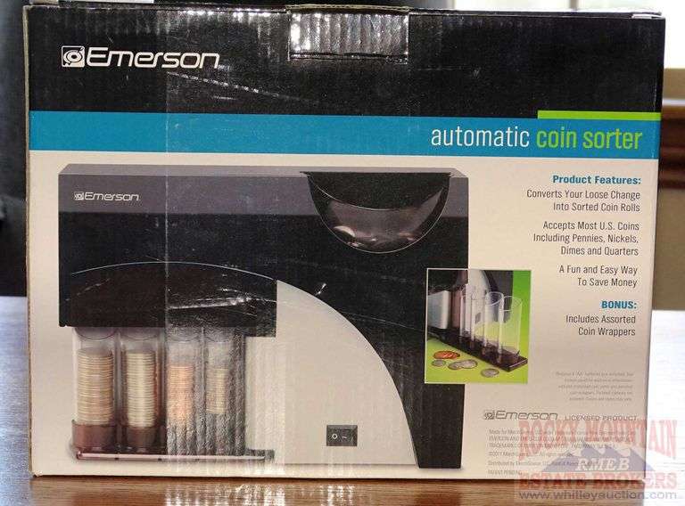Emerson 4 barrel automatic coin sorter. This appears to be new. Rocky