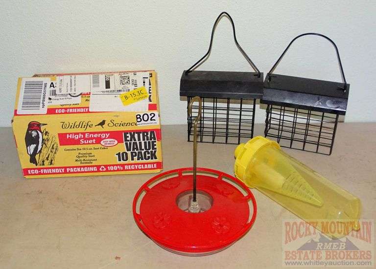 Assorted bird feeders, suet and yellow jacket trap. All for one money