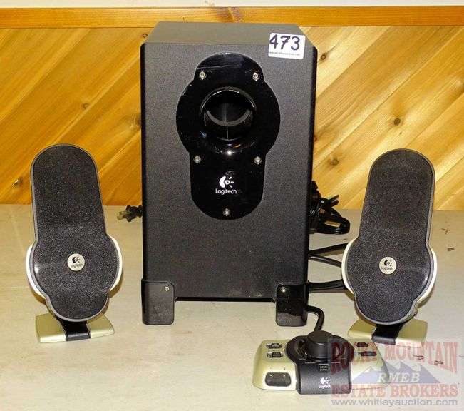 Logitech G51 surround sound speaker system with subwoofer, 2 speakers and controller. Rocky