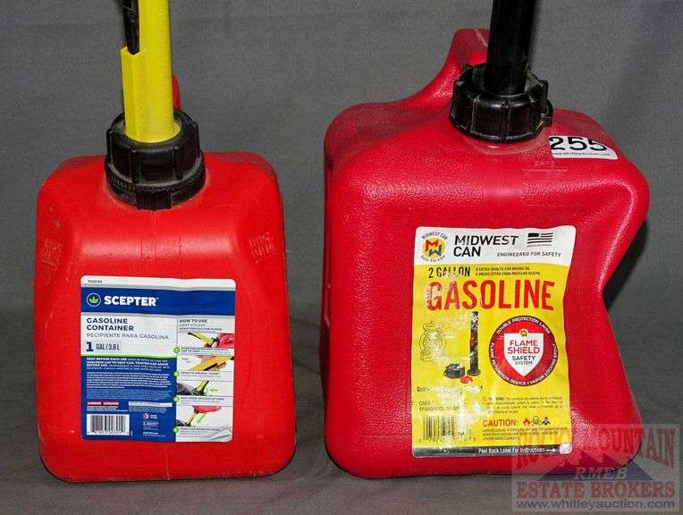 1 & 2 gallon gas cans. The 2 gallon can appears to be about 1/2 full