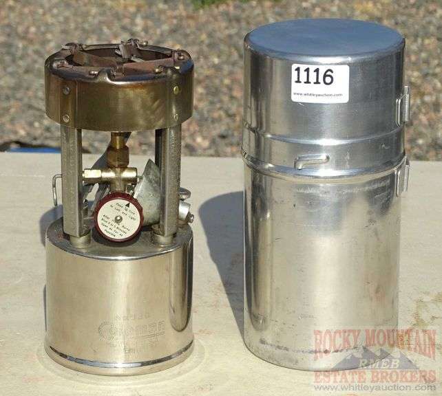 Vintage Coleman 530 stove with original case in nice looking condition