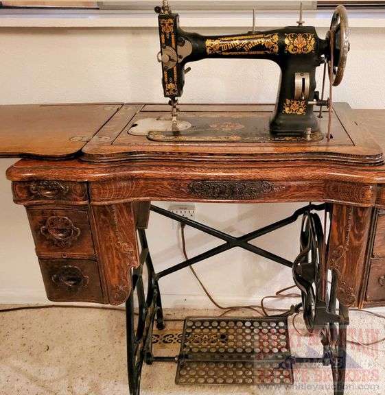 Fantastic White Family Rotary treadle sewing machine in one of the best