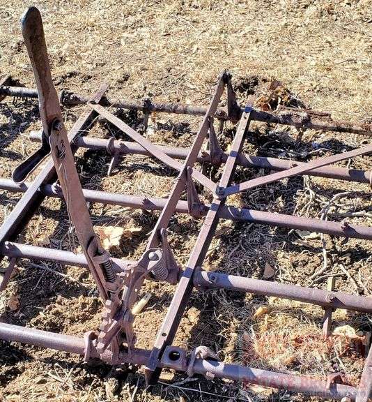 Vintage 8' spike tooth drag harrow. Rocky Mountain Estate Brokers Inc.