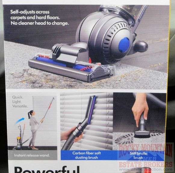 New Dyson Ball Upright Vacuum that will selfadjust between hardwood