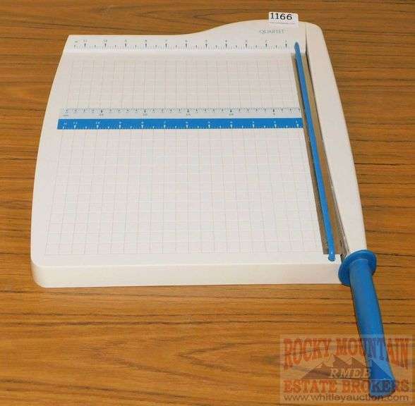 Quartet 12" paper cutter. Rocky Mountain Estate Brokers Inc.