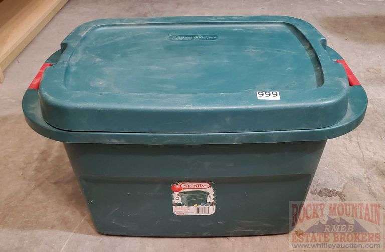 Green Sterilite tote with lid. Rocky Mountain Estate Brokers Inc.