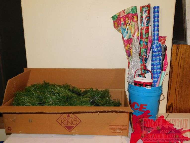 Asst. Christmas wrapping paper & Mountain King artificial tree. All for