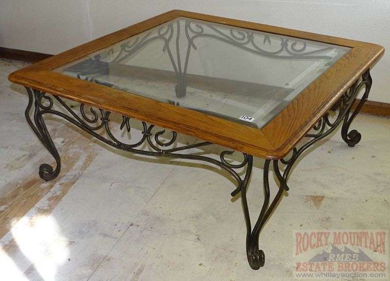 Heavy Wrought Iron, Wood & Glass Coffee Table. This has matching end