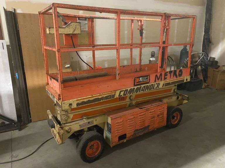 JLG Commander CM20N Scissor Lift, Electric Roller Auctions