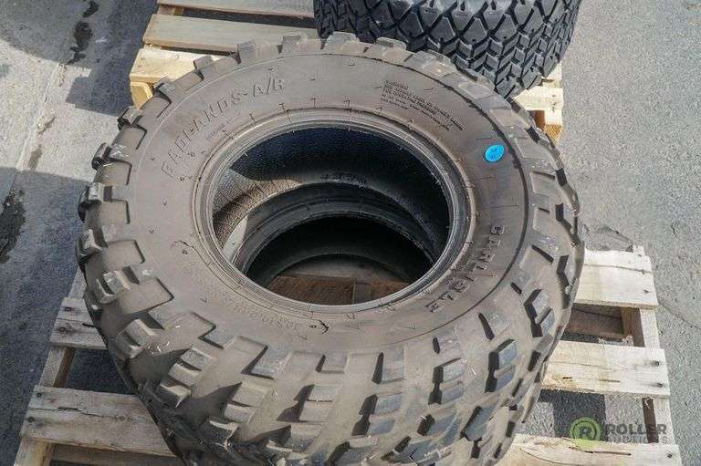 Carlisle HD Field Trax Tire, AT22.5x108 and (2) Carlisle Badlands A/R