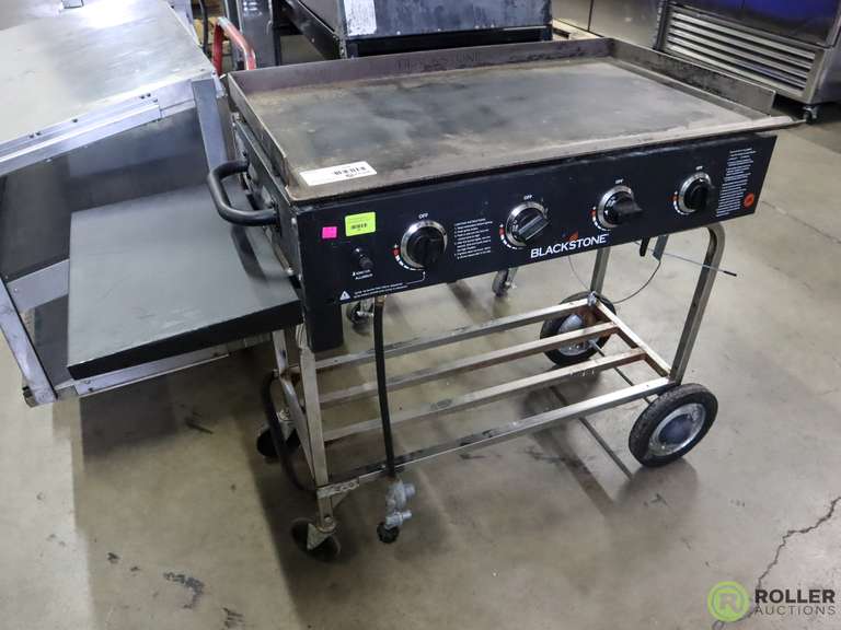 Blackstone 4Burner Flat Top Griddle, Propane on Casters Roller Auctions
