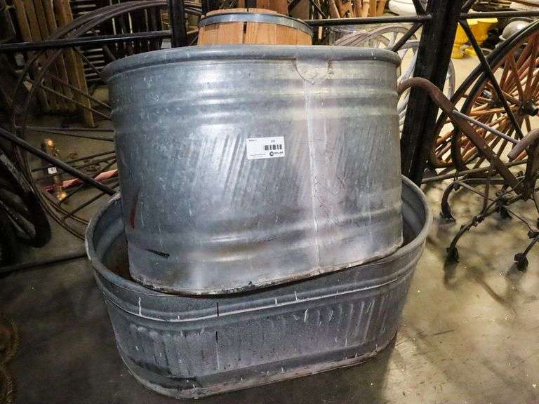 (2) Metal Horse Troughs With Wooden Barrel Roller Auctions