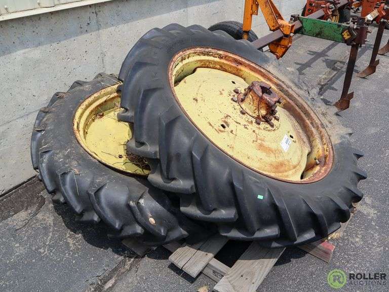 (2) Goodyear 11.2-34 Tractor Tires - Roller Auctions