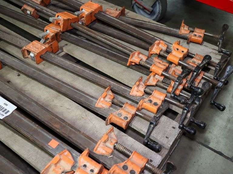 (14) Pipe Clamps Roller Auction