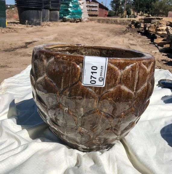 Pottery Roller Auction