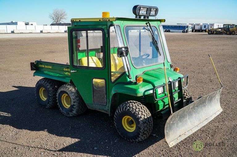 JOHN DEERE GATOR Enclosed Cab, 6x4, 72in Snow Plow , Hour Meter Reads